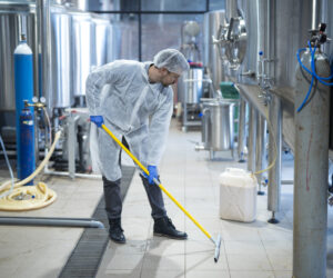 professional-industrial-cleaner-protective-uniform-cleaning-floor-food-processing-plant